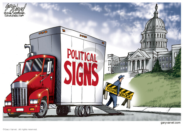 Political signs. Road block.